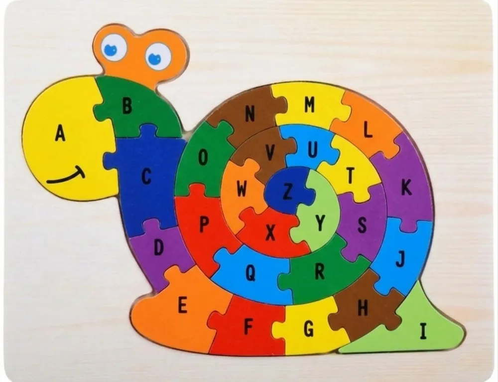 Snail Alphabet Jigsaw Puzzle — DXF linework preview